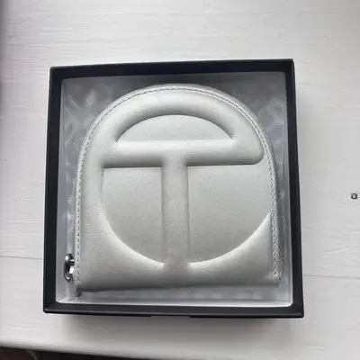 Mercari ChatGPT ad: telfar Wallet Silver NIB - New Women | Color: Silver