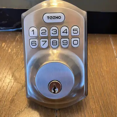 Mercari ChatGPT ad: August Keyless Entry Door Lock - New Electronics | Color: Grey