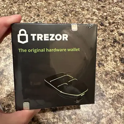 Mercari ChatGPT ad: Nano Trezor Hardware Wallet NEW - New Electronics | Color: White